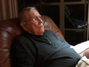 Eddie Robinson relaxes while watching Game 2 of the World Series.